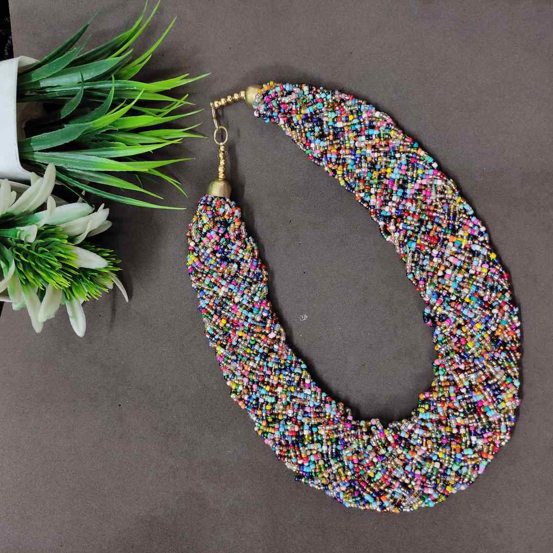 LARQ JEWELS THE BEAUTEOUS BRAIDED CRISS-CROSS BEADED NECKLACE- multi