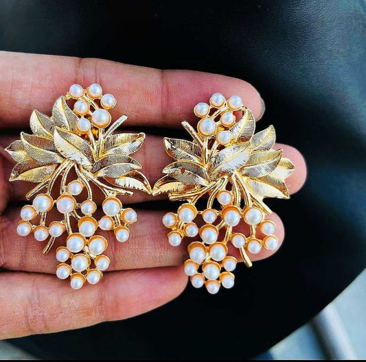 LARQ JEWELS Trending Golden Metal Oxidised Flower Pearl Stud Earrings