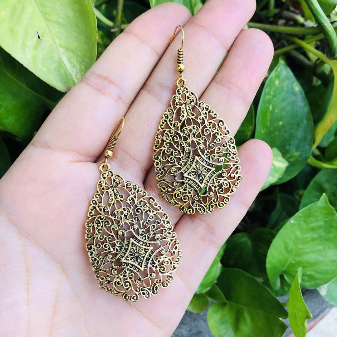 LARQ JEWELS Leaf shaped hollow patterned brass earring