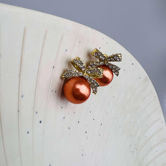 Amber Pearl Bow Stud Earrings