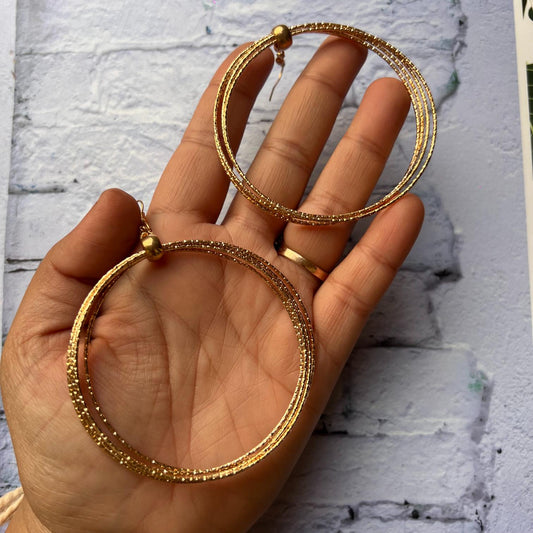 Multiple Golden Cirular Earrings