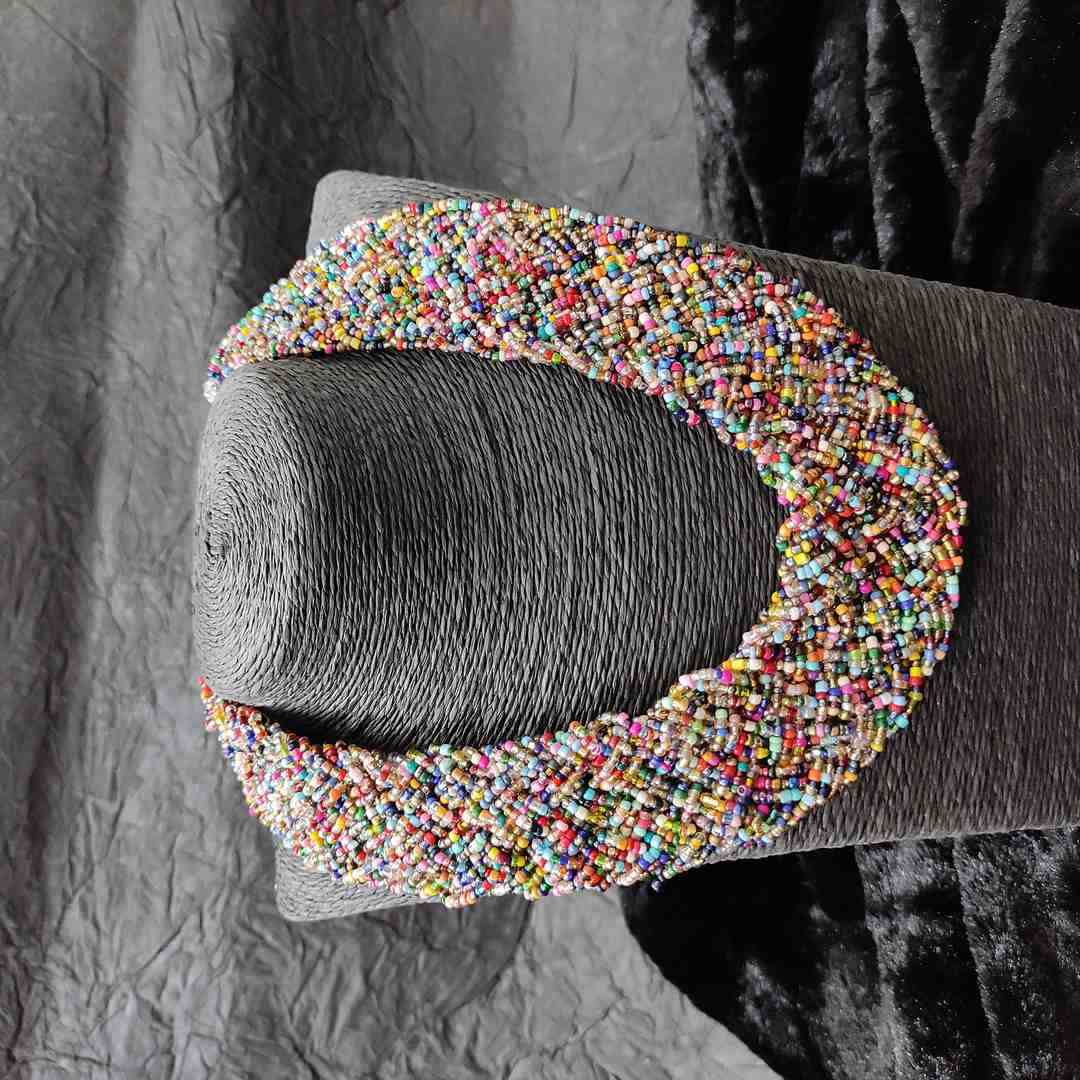 LARQ JEWELS THE BEAUTEOUS BRAIDED CRISS-CROSS BEADED NECKLACE- multi