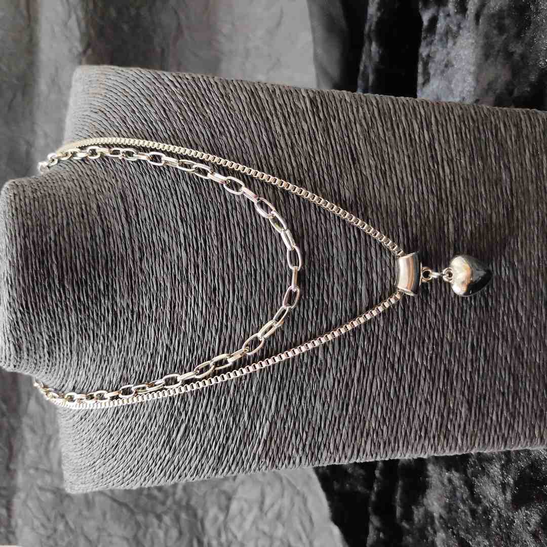 LARQ JEWELS Imitation Black Polish multi strand heart pendant