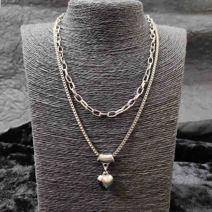 LARQ JEWELS Imitation Black Polish multi strand heart pendant