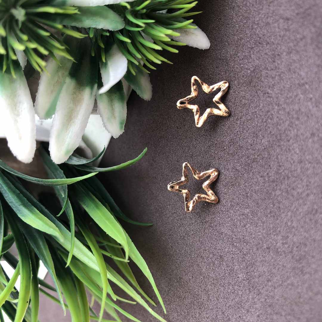 Non Precious Metal Silver Rhodium tone Star Stud Earrings