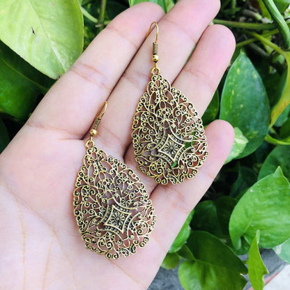 LARQ JEWELS Leaf shaped hollow patterned brass earring