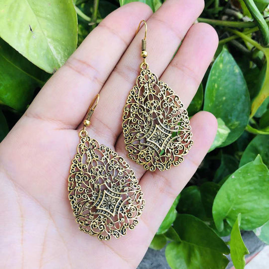 LARQ JEWELS Leaf shaped hollow patterned brass earring