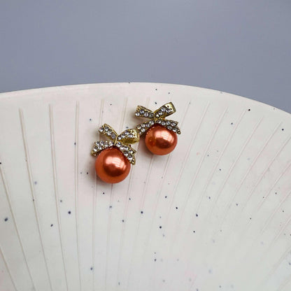 Amber Pearl Bow Stud Earrings