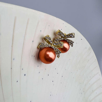 Amber Pearl Bow Stud Earrings