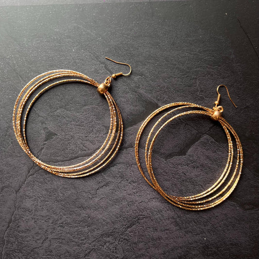 Multiple Golden Cirular Earrings