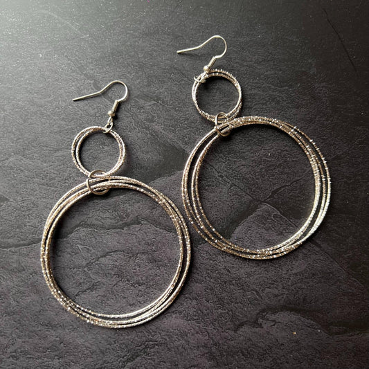 Multiple Silver Cirular Earrings