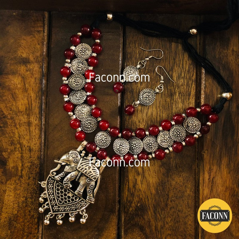 LARQ JEWELS Maroon Silver German Beaded Elephant Necklace Set